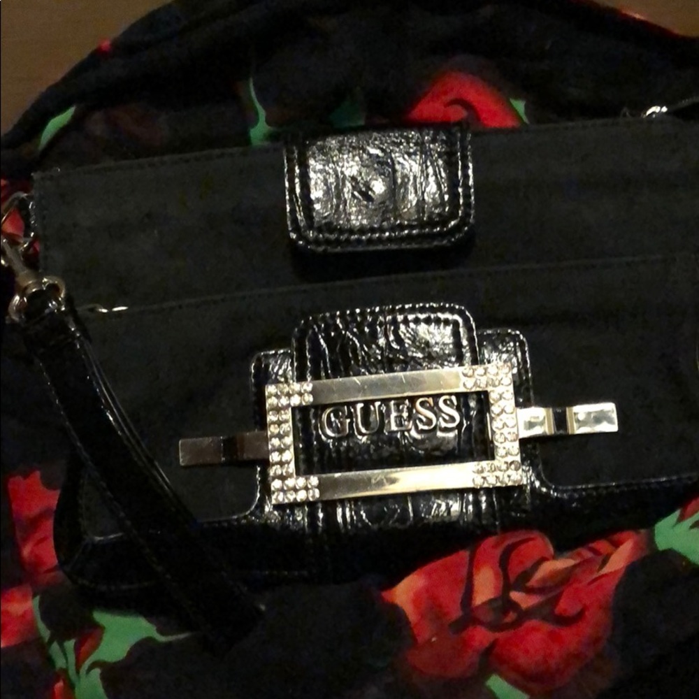 Guess black clutch/wristlet.